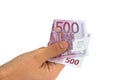 ManÃ¢â¬â¢s hand holding five hundred 500 Euro banknote money bill i Royalty Free Stock Photo
